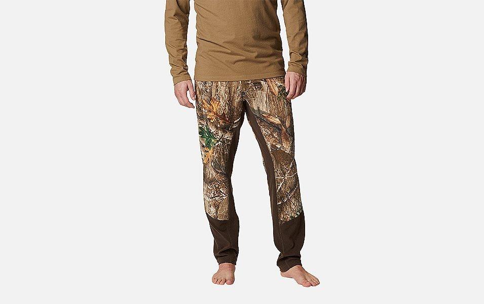 A product image of a woman wearing Columbia Sportswear’s PHG Tropy Rack Omni-Heat Helix Fleece Pants against a white background.  

​ 