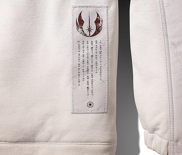 Close-up of Aurebesh script on pullover. 