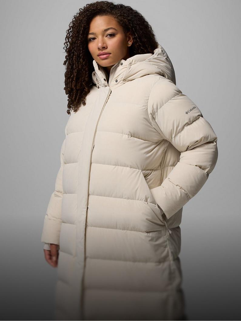 A woman wearing a puffer jacket