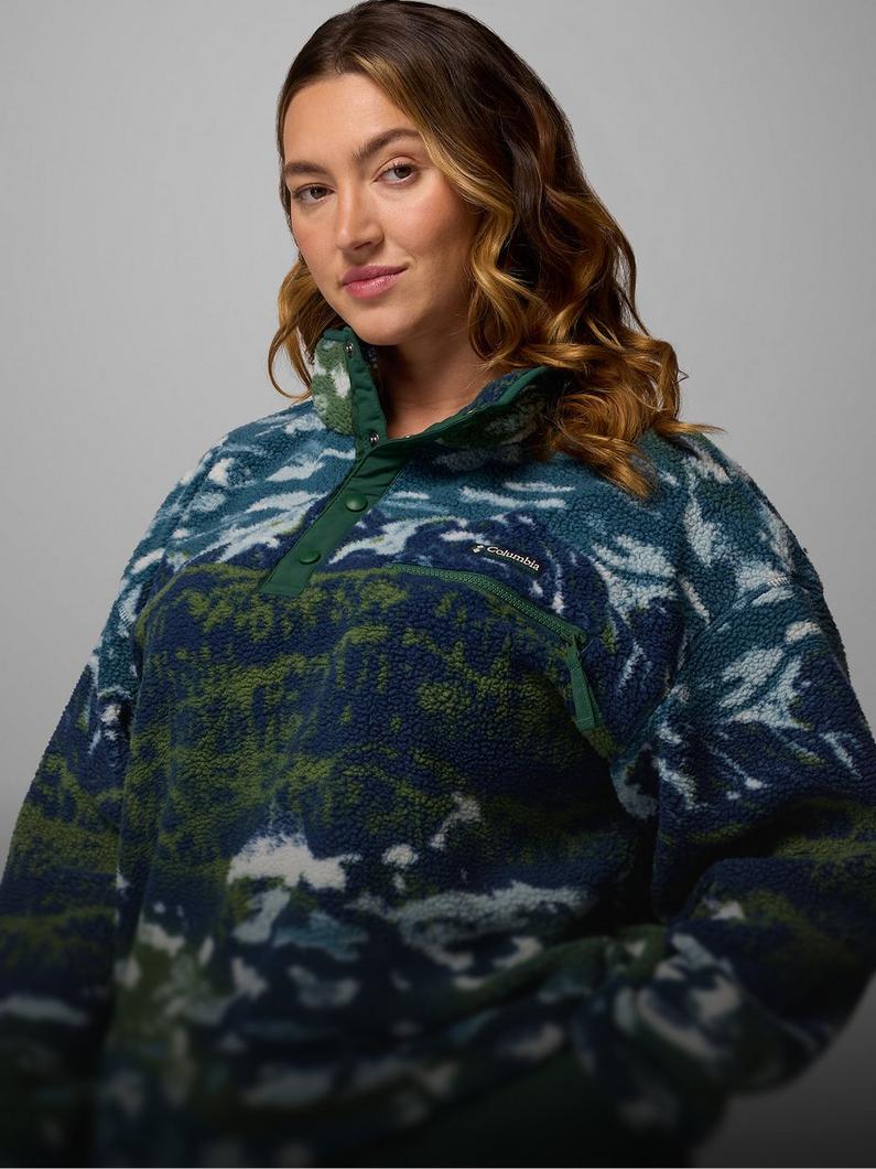 A woman wearing a printed fleece
