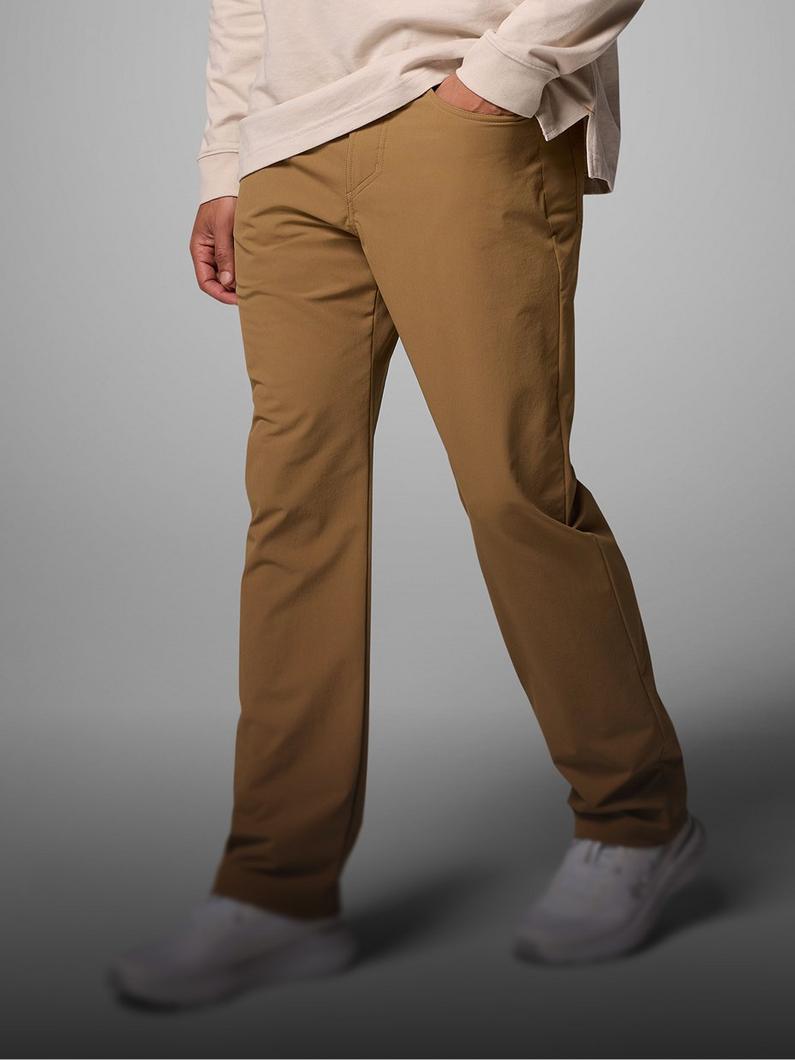 A person wearing brown pants