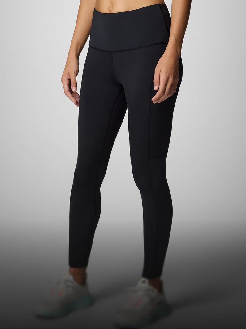 A person wearing black leggings