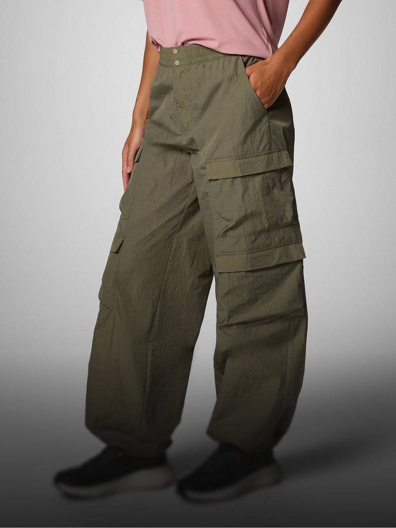 A person wearing olive pants