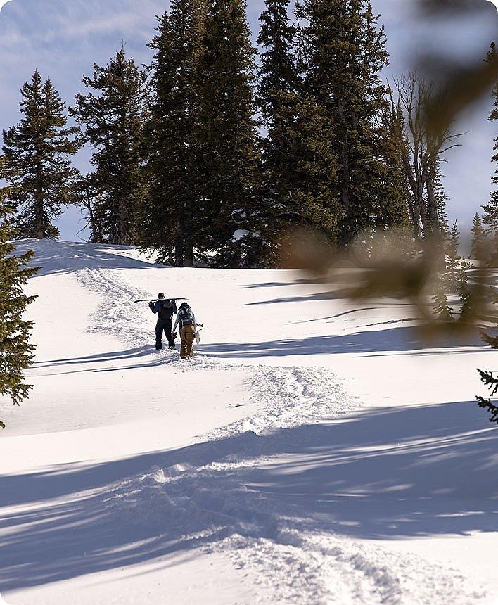 skinning up a mountain in the backcountry