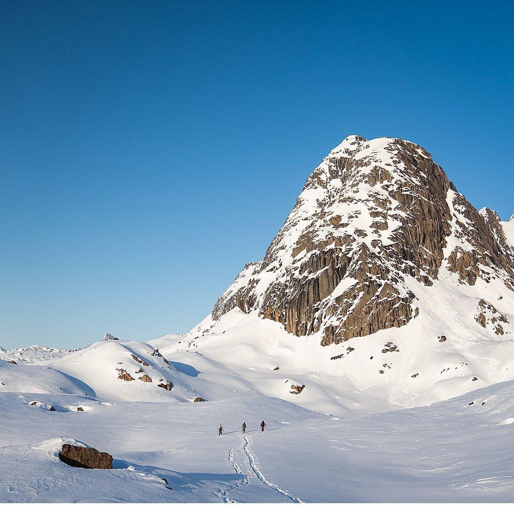 Big landscape tiny Rachael and Jessica skinning across the mountain.