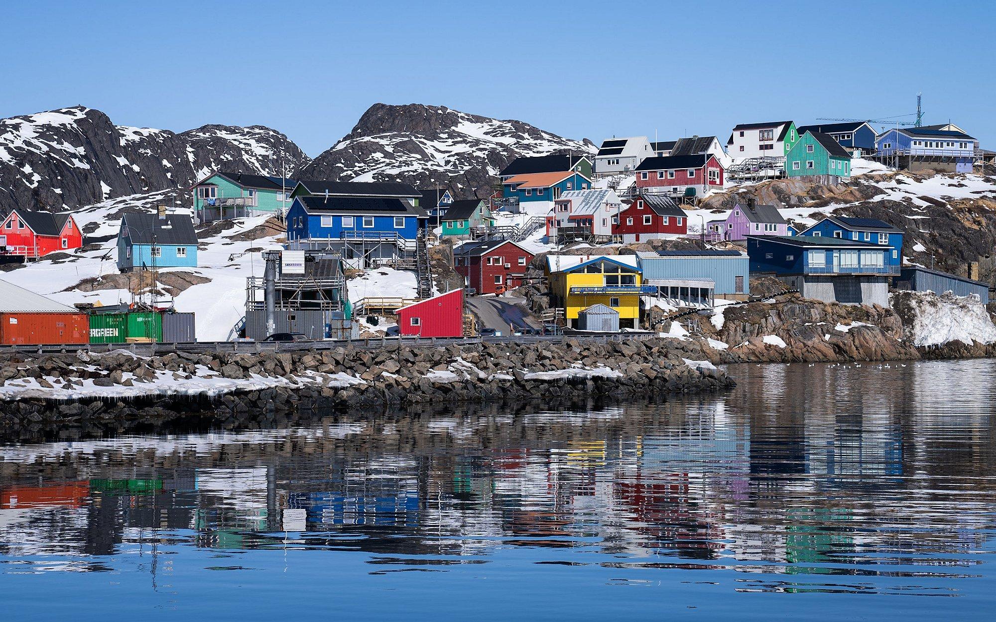 Landscape image of a town in Greenland.