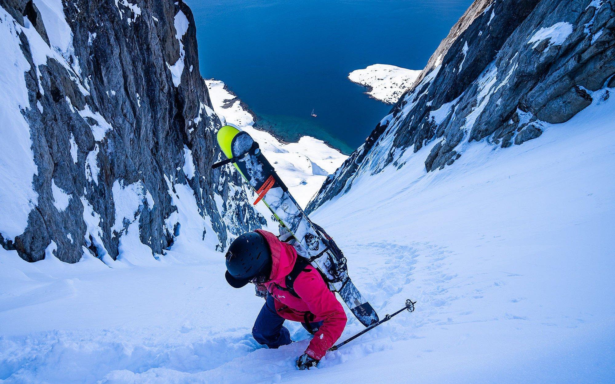 Rachael climbing to the top of the ski run in Greenland.