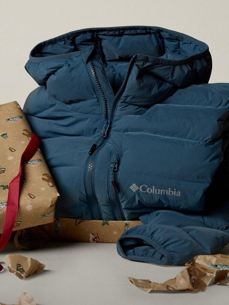 A puffer jacket bursting out of wrapping paper.