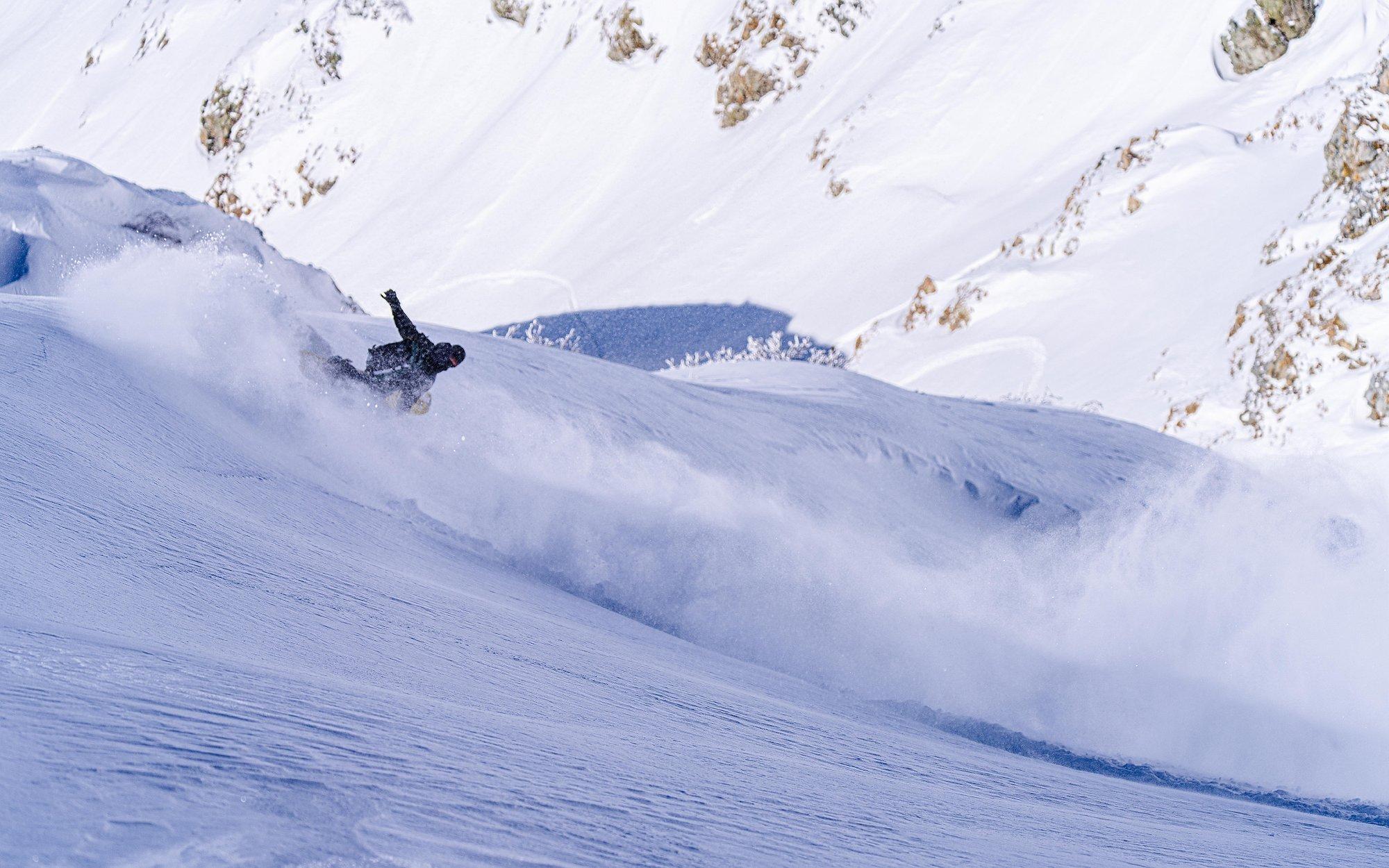So much powder! Daisuke cuts through the shot on a beautiful run.