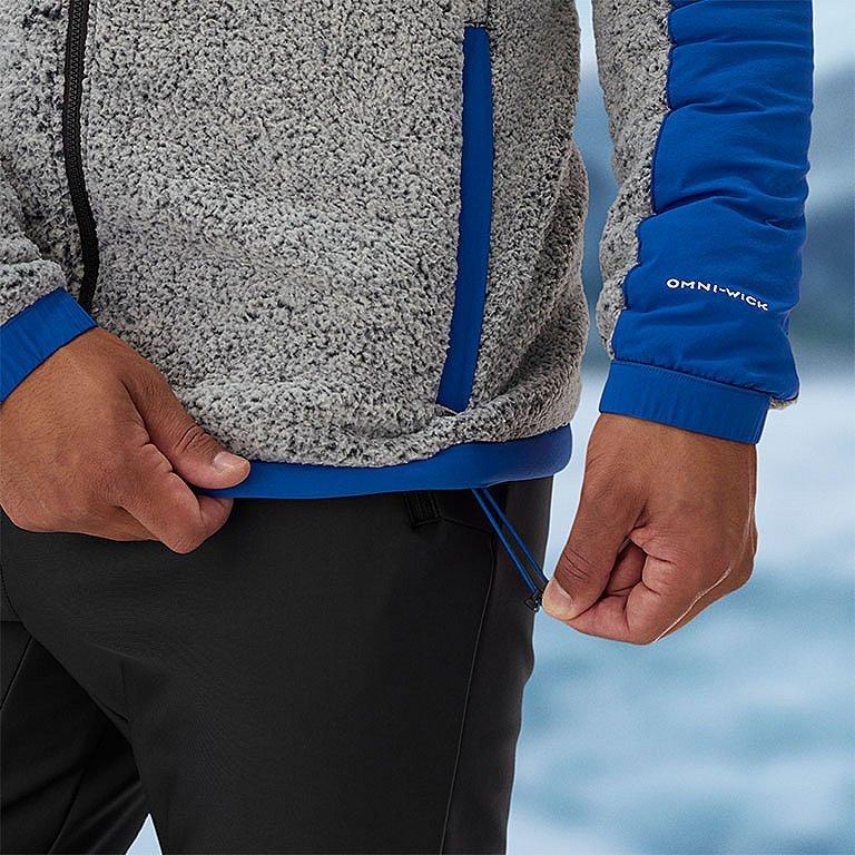 Model either taking off or putting on the included belt.