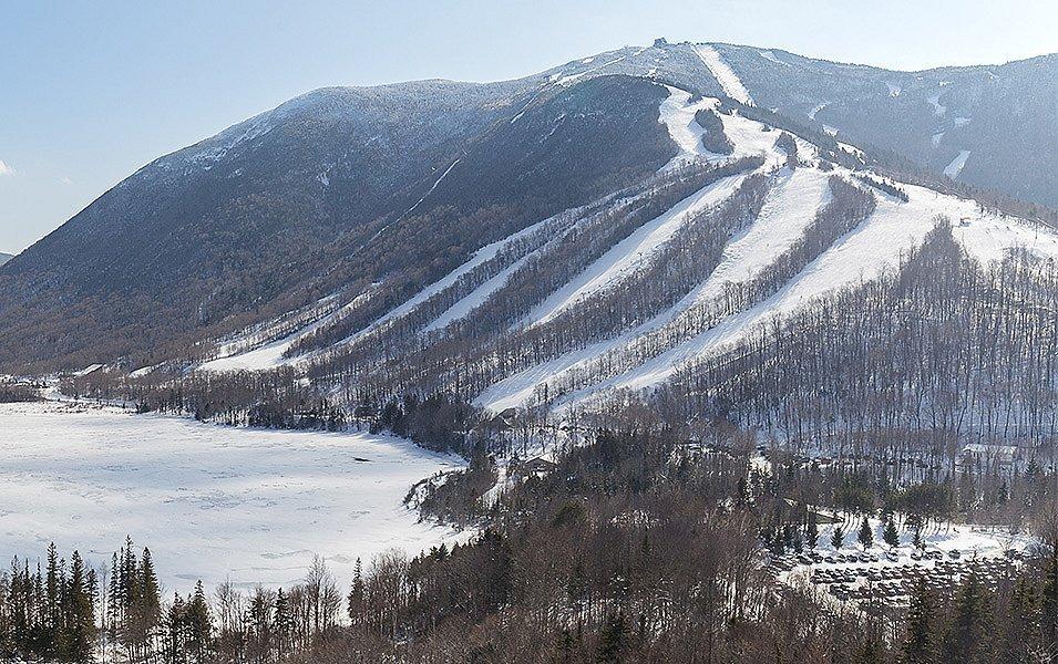 Multiple runs wind down Loon Mountain Ski Resort, one of many New Hampshire resorts offering adaptive skiing and snowboarding programs for individuals of all abilities.