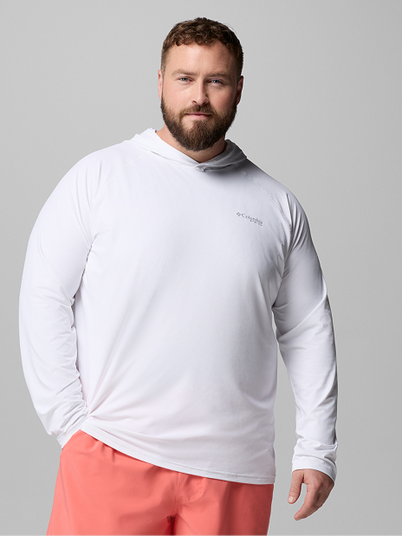 A man wearing a white PFG hoodie.