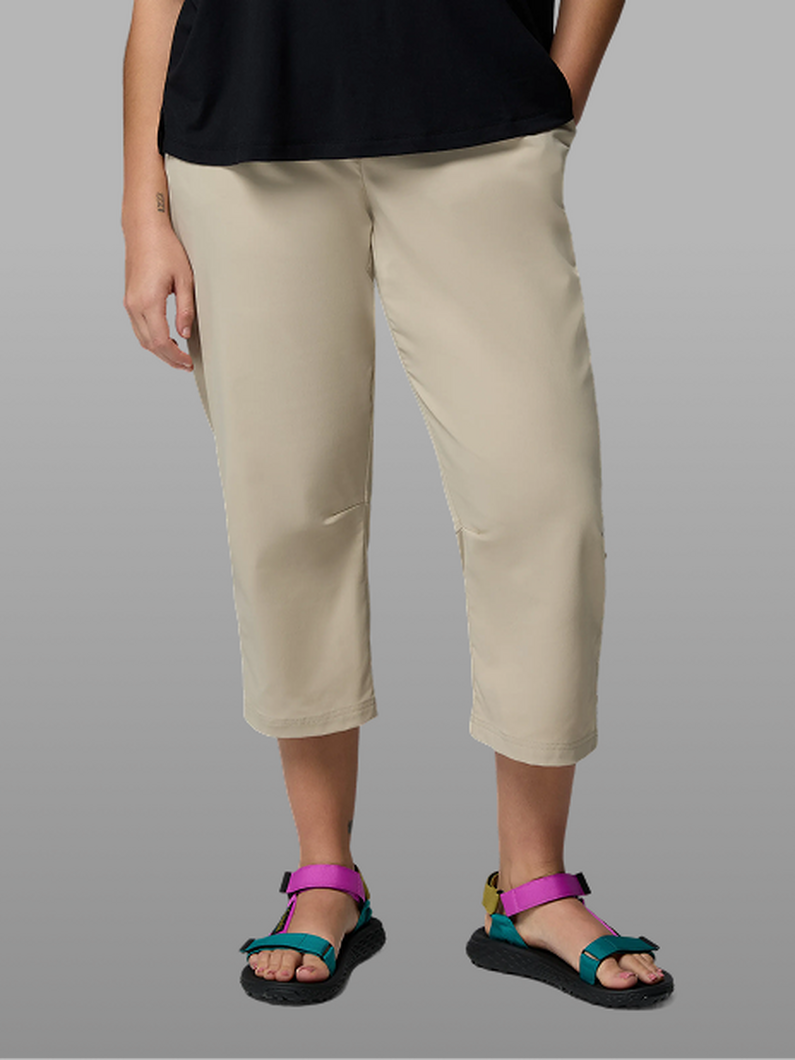 A woman wearing tan capris.