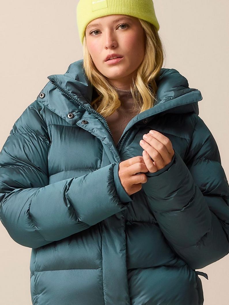 A modale in the blue shiny Amaze Puff jacket.