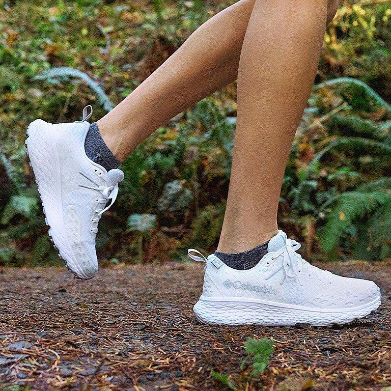 A close up view of the Konos sneaker on foot.