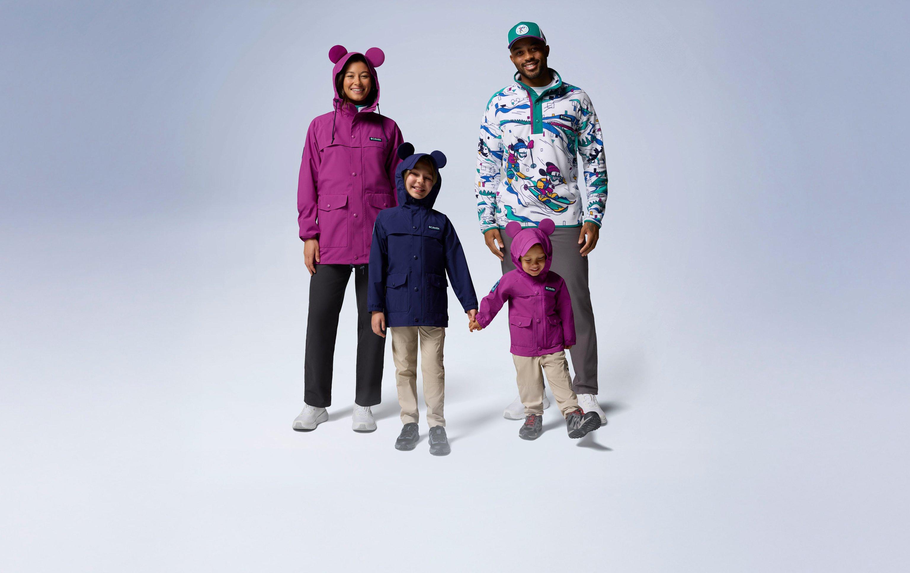 Family wearing retro-inspired Disney gear.