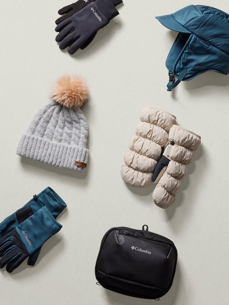An arrangement of various winter accessories and gear.