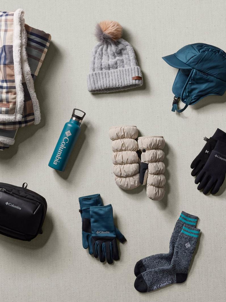 An arrangement of various winter accessories and gear.