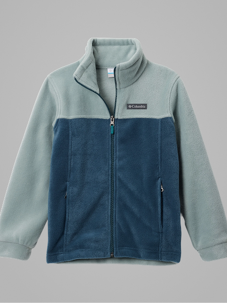 A little boy wearing a dark green ski jacket with a helmet and goggles on with text: Boys