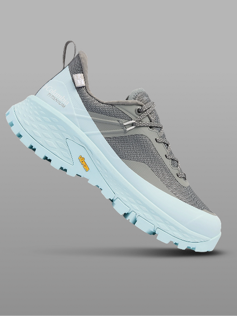 A grey and blue hiking shoe.