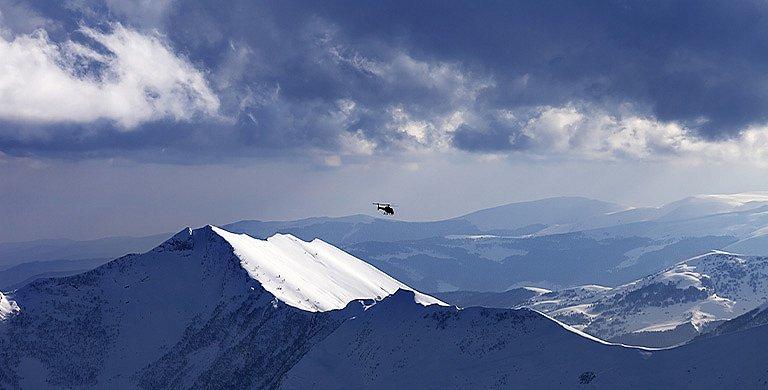 Leave the resort crowd behind to explore the worlds of snowcat and helicopter skiing and boarding.