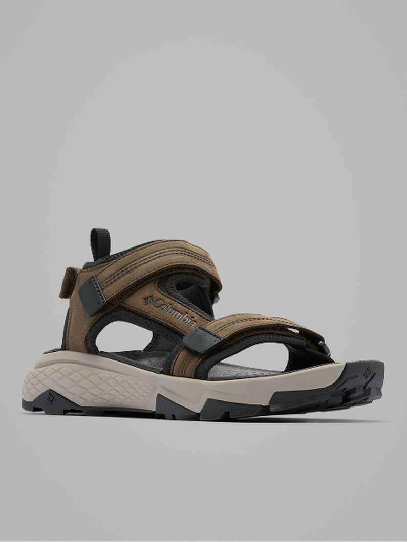 Brown and black sport sandal with adjustable straps and chunky sole, shown from side view.