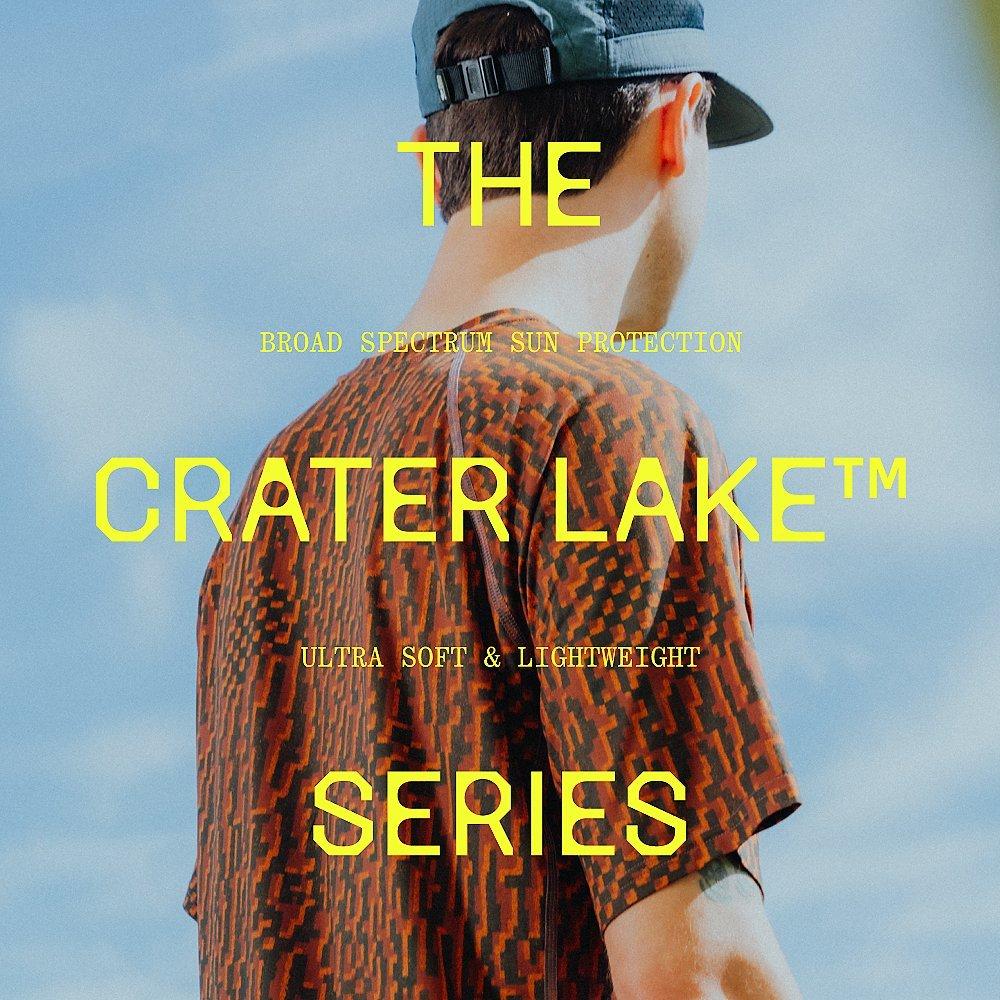 "The Crater Lake™ Series: Broad Spectrum Sun Protection, ultra soft & lightweight" type overlaid on an image of a man wearing a Crater Lake short sleeve shirt with a blue sky in the background.