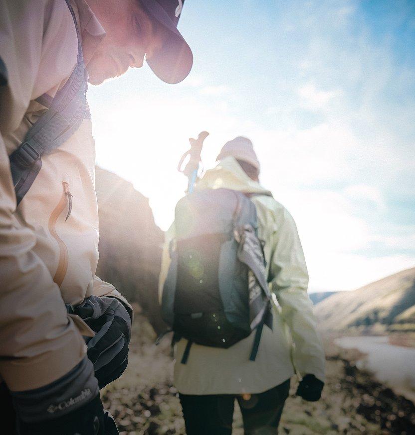 Mand and women hiking on a brisk day.