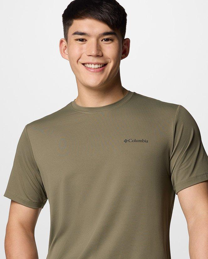 A man wearing a yellow t-shirt.