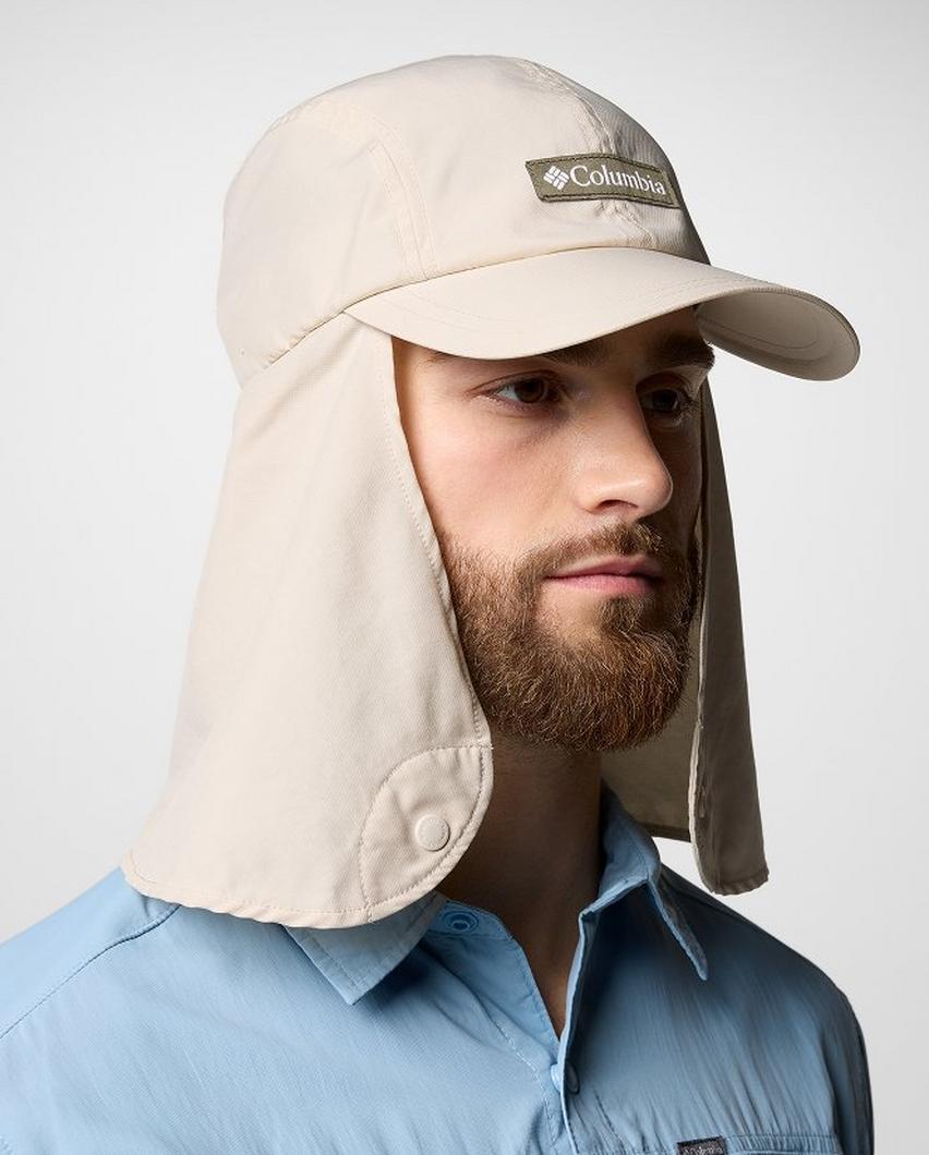 A man wearing a tan sun hat.