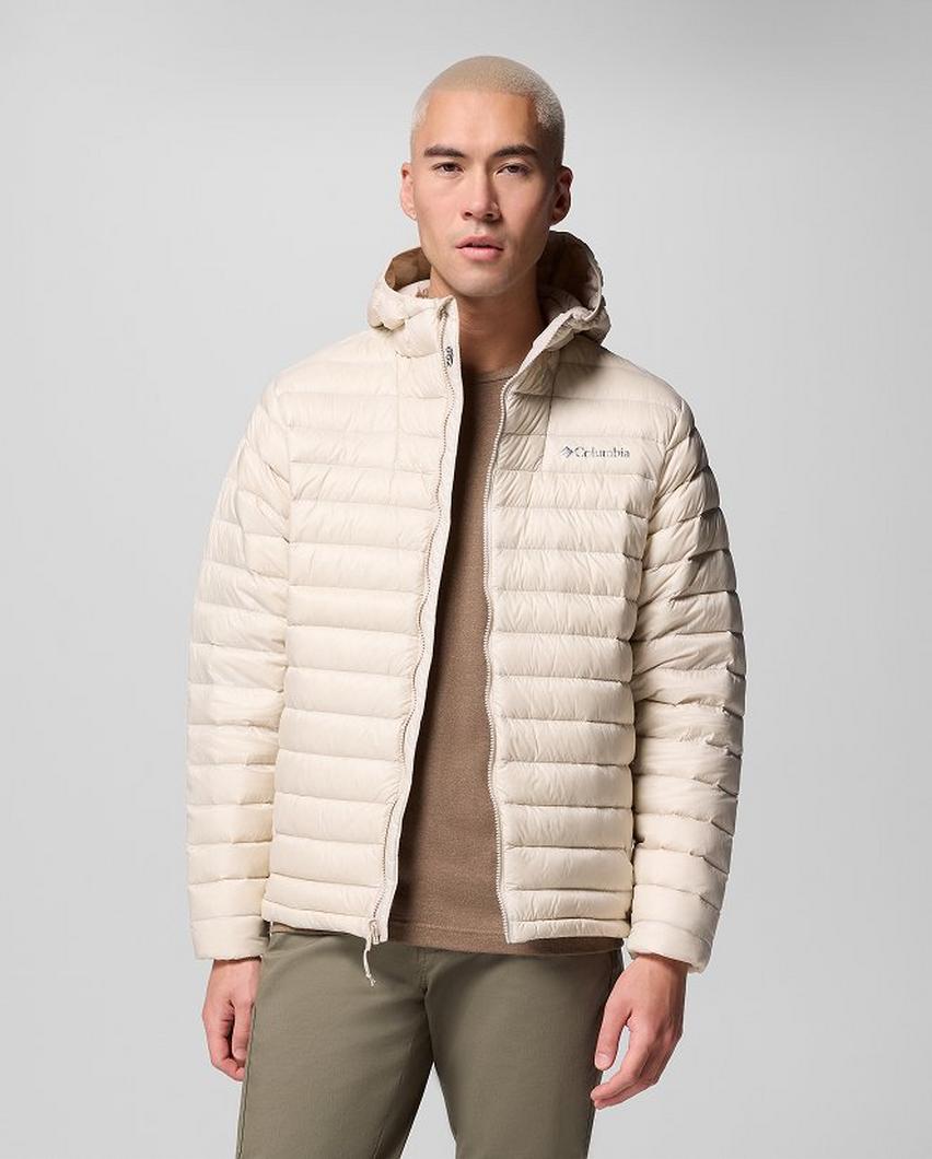 A man wearing a white puffer jacket