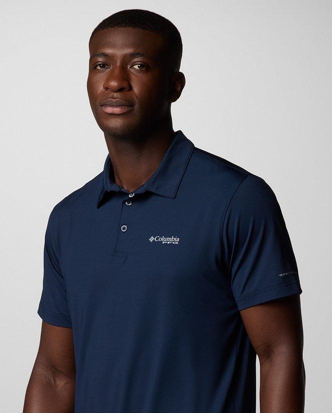 A man wearing a navy polo.