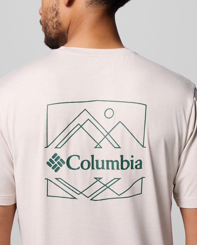 A man with his back to camera showing his white graphic tee with Columbia logo and artwork.