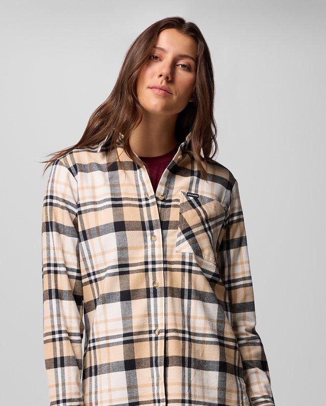 A woman wearing a flannel button-up.