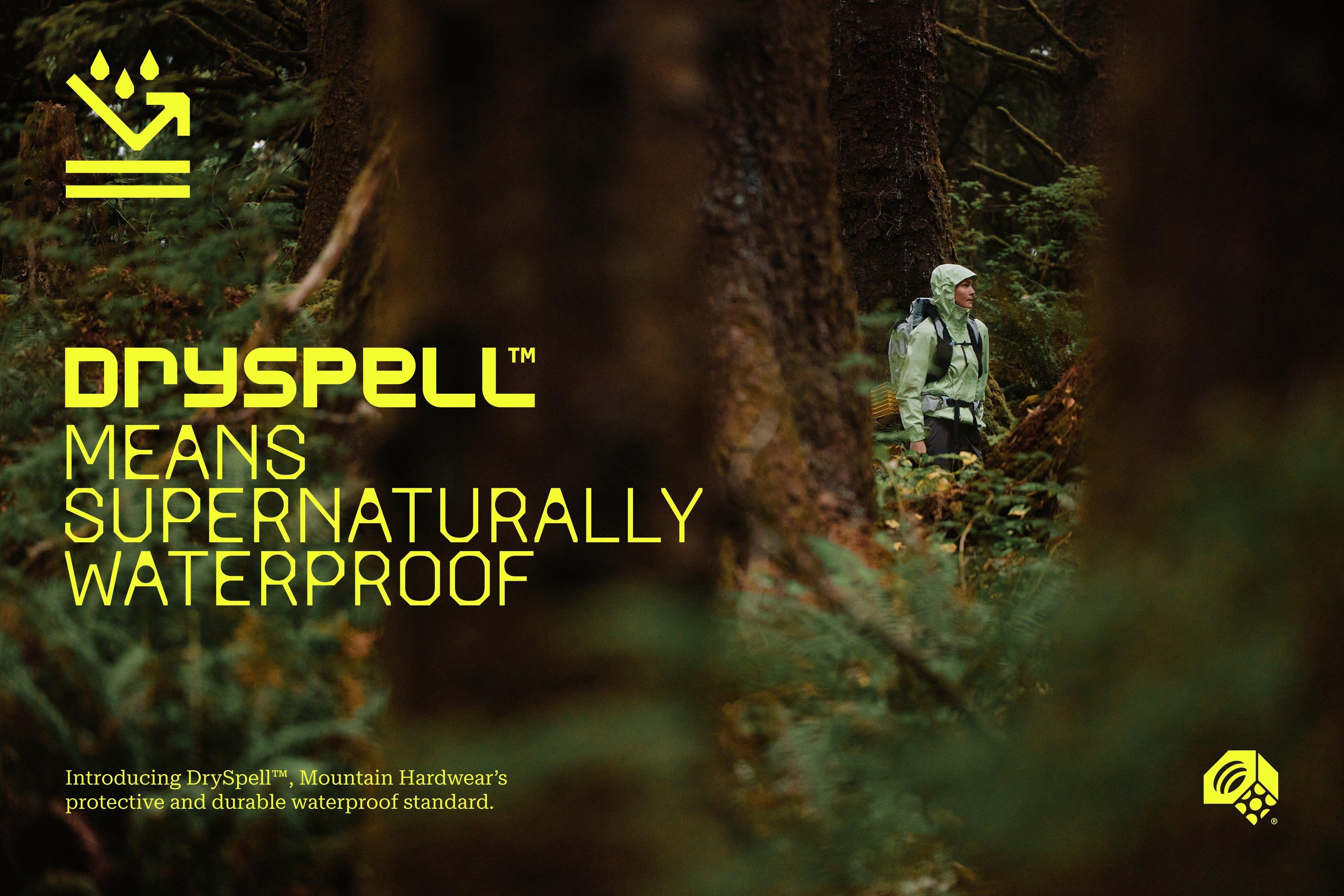 DRYSPELL MEANS SUPERNATURALLY WATERPROOF. Introducing DrySpell™, Mountain Hardwear’s protective and durable waterproof standard. Peering through branches and between trunks in a redwood forest, a woman in a zipped Cloud Cipher™ Hooded Rain Jacket treks along. 
