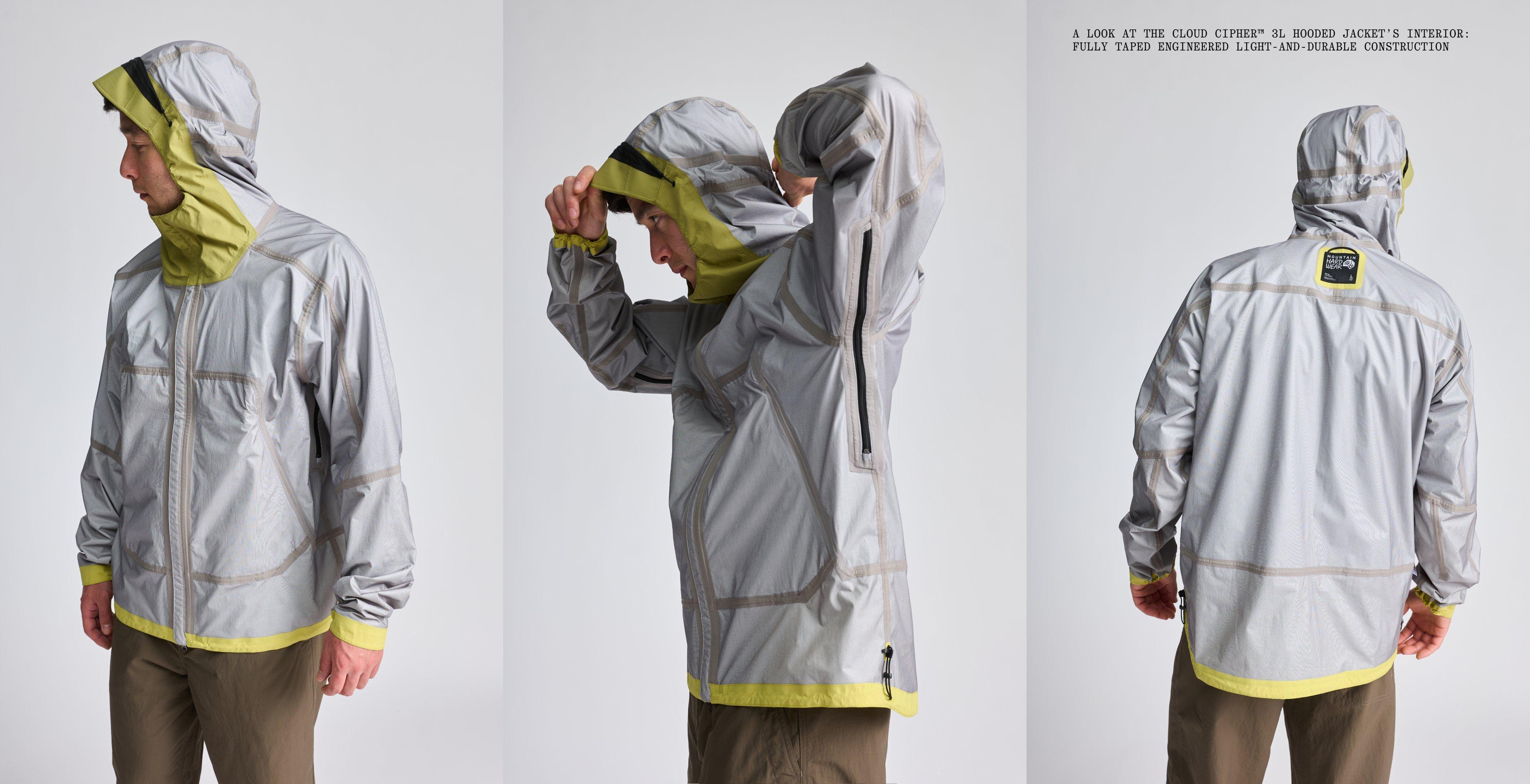 A man in an inside-out Cloud Cipher™ Hooded Jacket, displaying the fully taped interior construction.