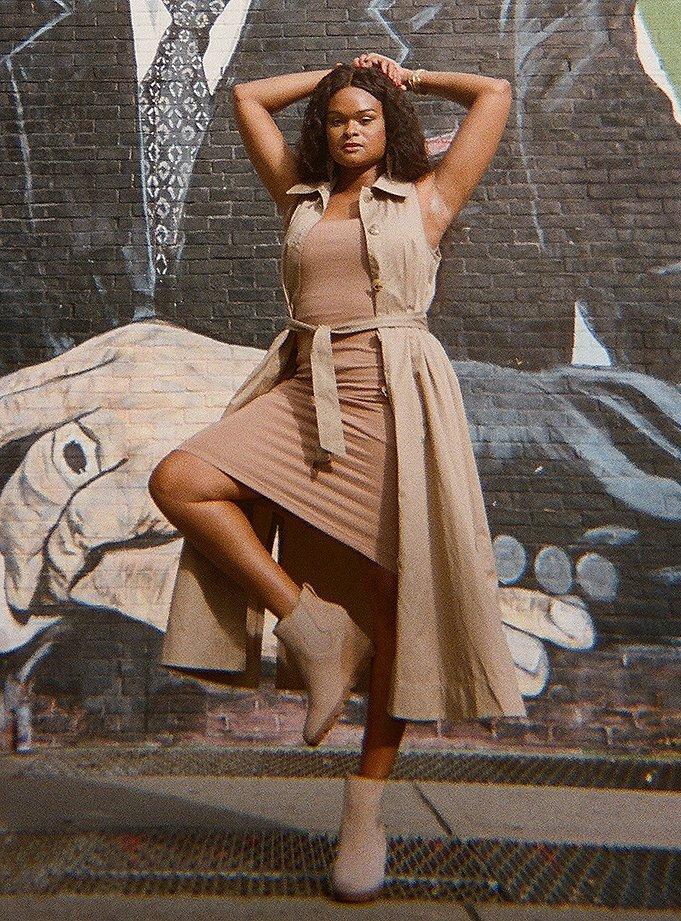 Raquel Willis wearing Joan Uptown Chelsea wedges in an urban setting