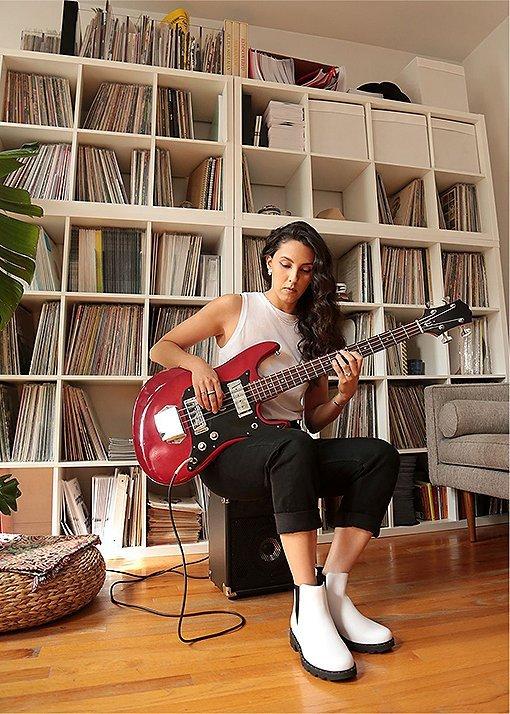 Barbie Bertischwearing Lennox Chelsea booties in an urban setting