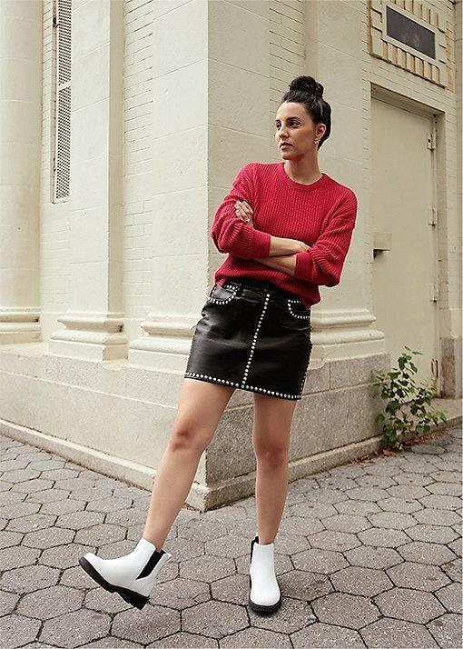 Barbie Bertischwearing Lennox Chelsea booties in an urban setting