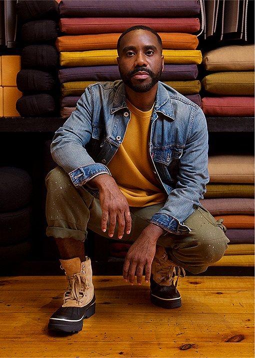 Darian Hall wearing Caribou Storm boots in an urban setting