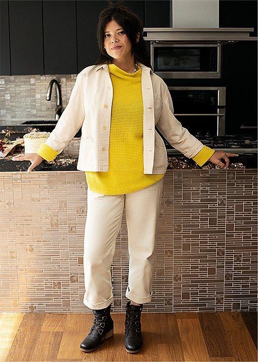 Natasha Pickowicz wearing Cate Lace booties in a kitchen
