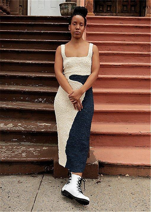 Marjon Carlos wearing Lennox Lace booties in an urban setting