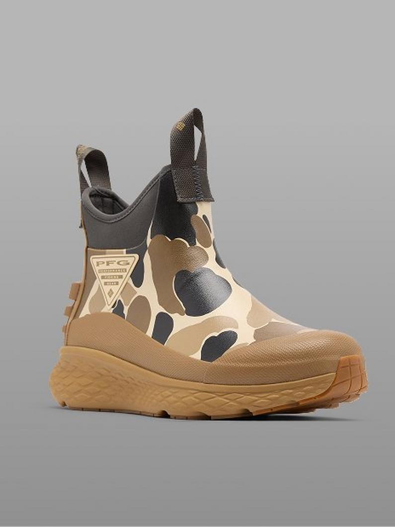 Waterproof ankle boot with tan camouflage pattern, black neoprene collar, and chunky gum sole.