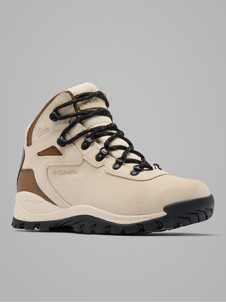 Beige hiking boot with brown accents, black laces, and rugged black sole.