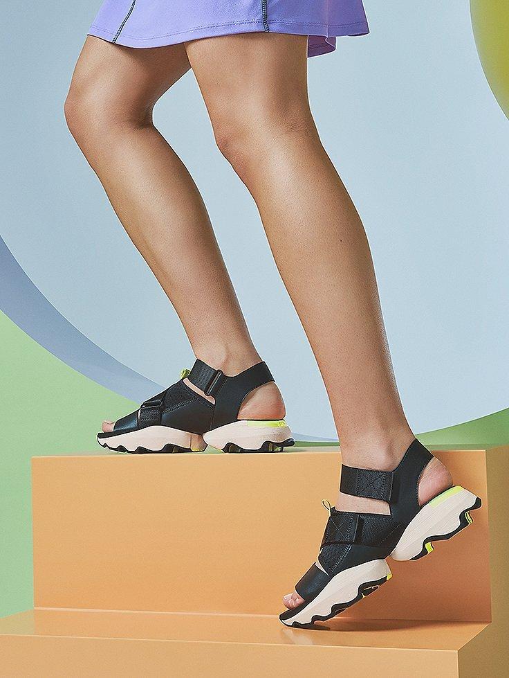 Woman wearing Kinetic Impact sandals