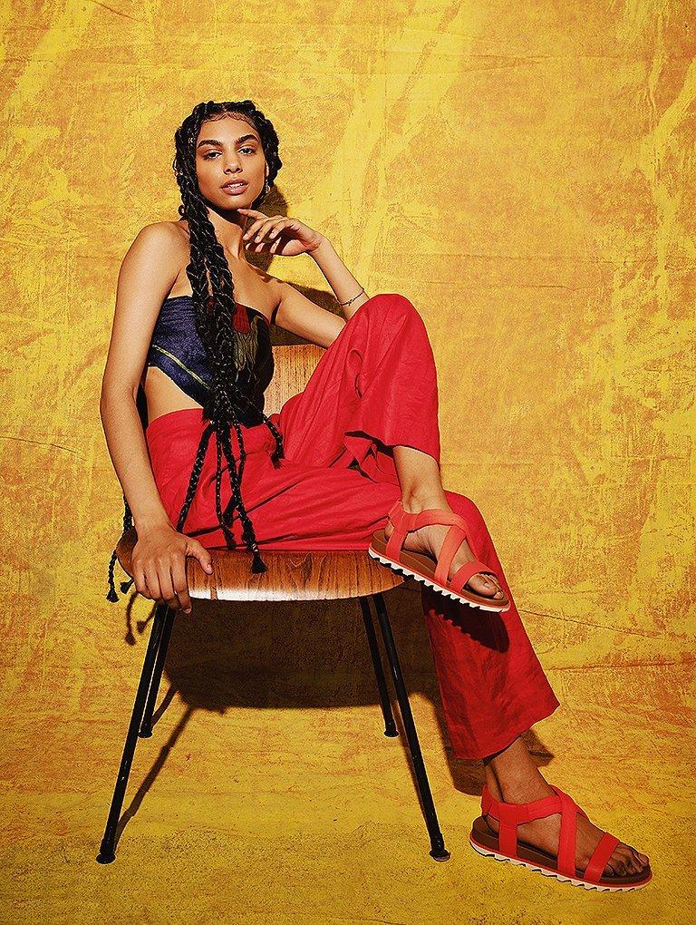 Monique Jones wearing Roaming Decon sandals
