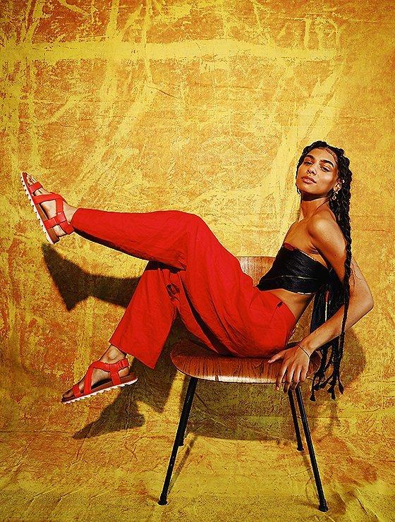 Monique Jones wearing Roaming Decon sandals