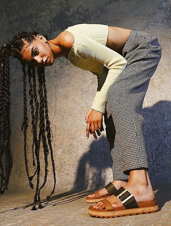 Monique Jones wearing Roaming Buckle Slide sandals