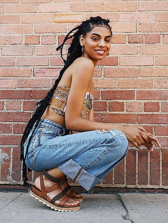 Monique Jones wearing Roaming Multi Strap sandals