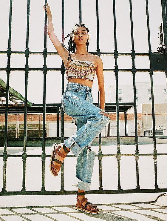 Monique Jones wearing Roaming Multi Strap sandals